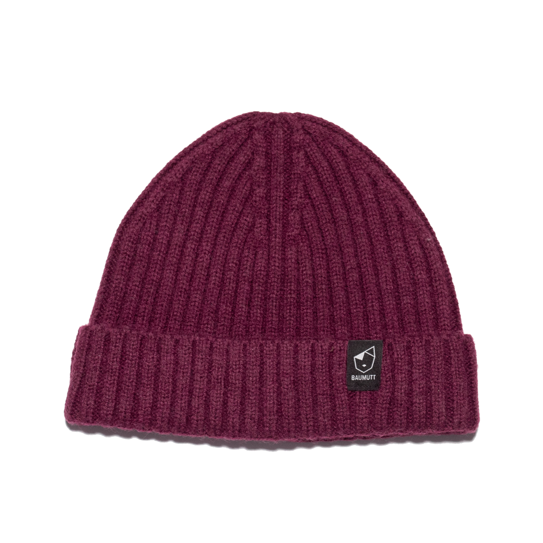 A burgundy red BAUMUTT fisherman beanie hat with a snug fit, designed for men and women. front view