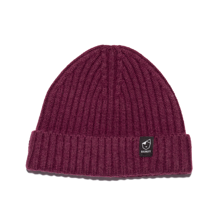 A burgundy red BAUMUTT fisherman beanie hat with a snug fit, designed for men and women. front view